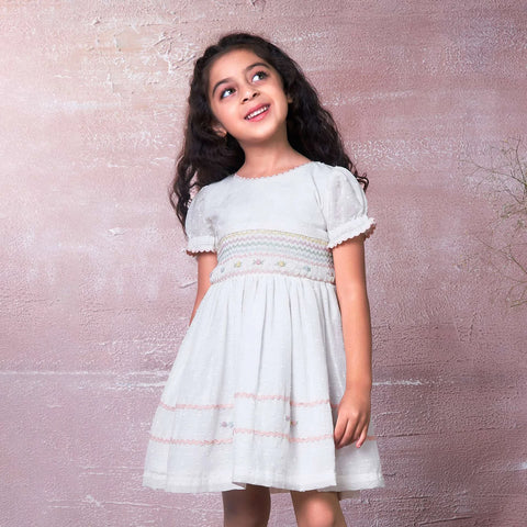 Soleilclo Ivory Swiss Dot Smocked Girls Dress